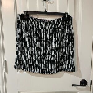Reversible faux wrap skirt by CAbi. XL - black and white and multi color.